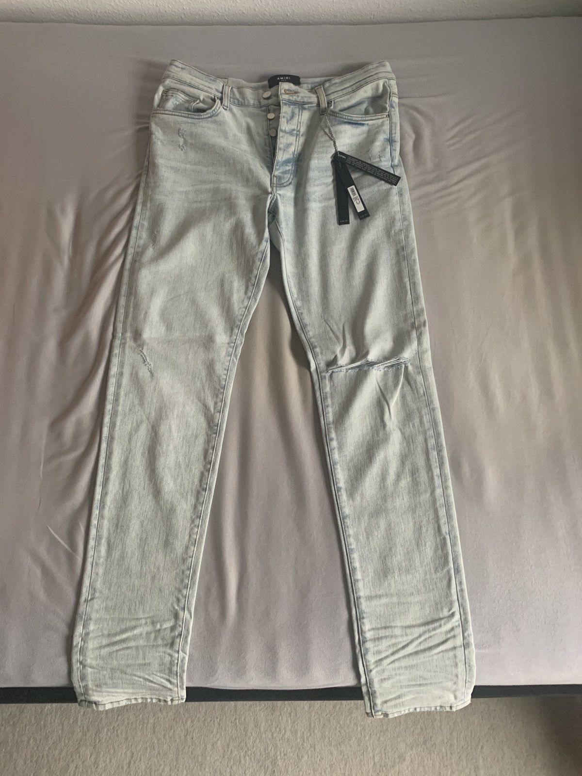 image of Amiri Slit Knee Denim Jeans Slim Denims Pants Damaged Ripped in Blue, Men's (Size 34)