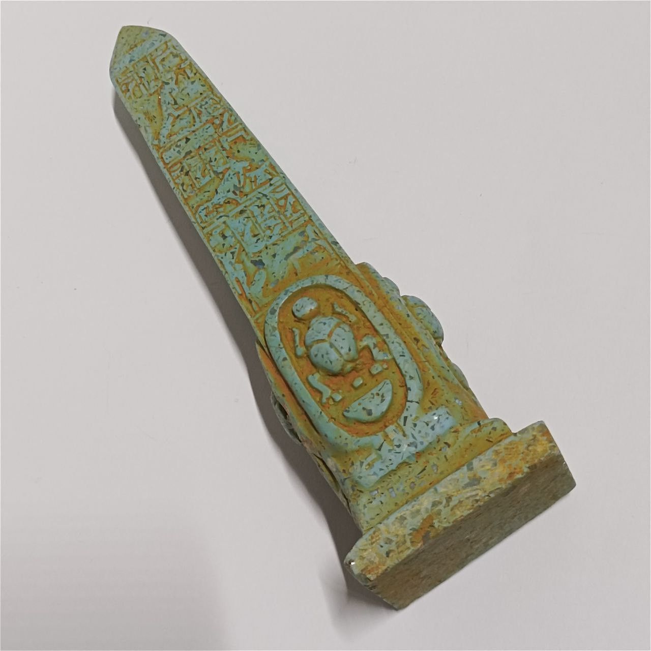 Replica Egypt obelisk with carved hieroglyphs made from rare