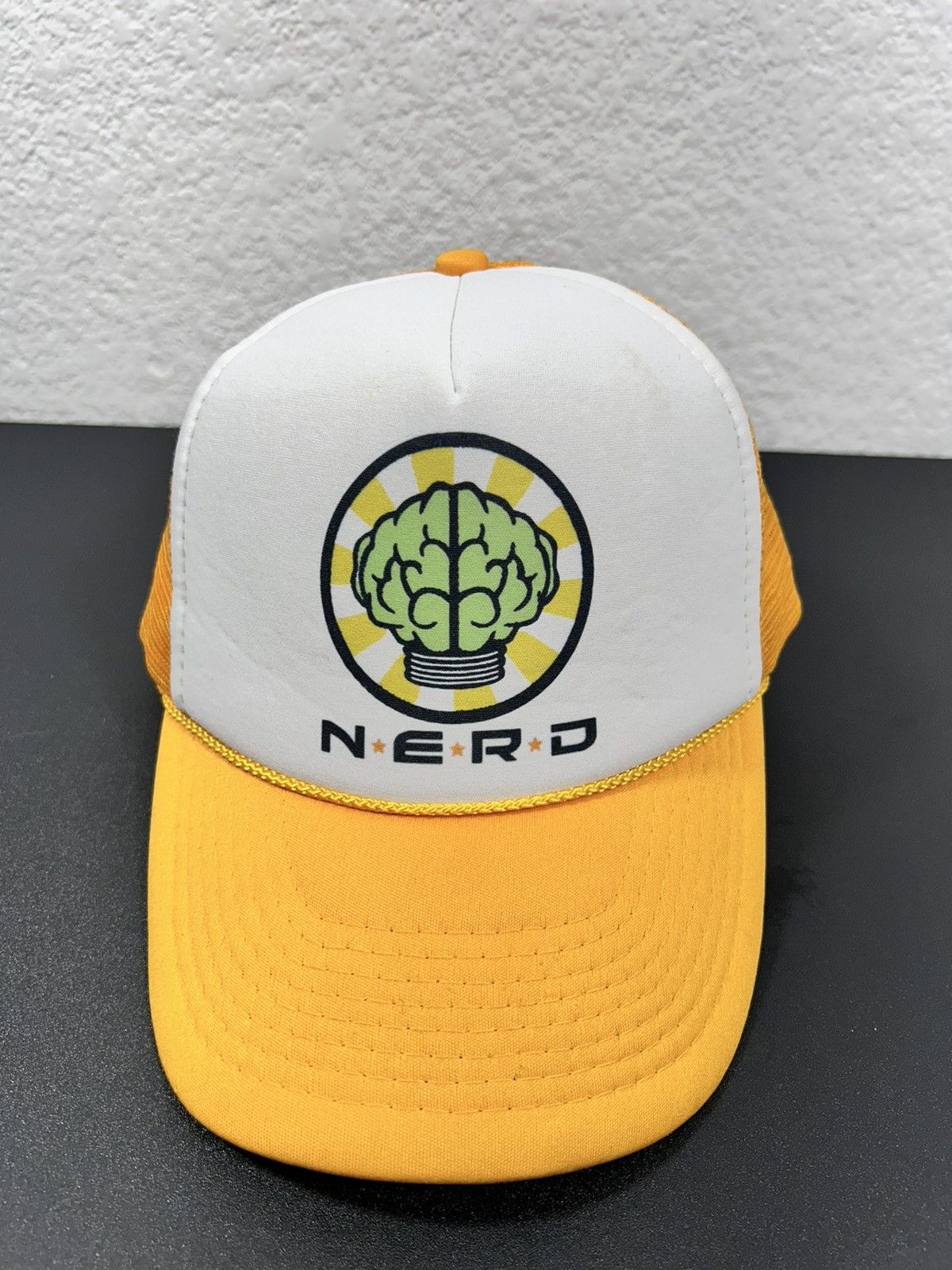 image of Pharrell x Rap Tees Nerd Vintage Hat 00’S in Yellow, Men's