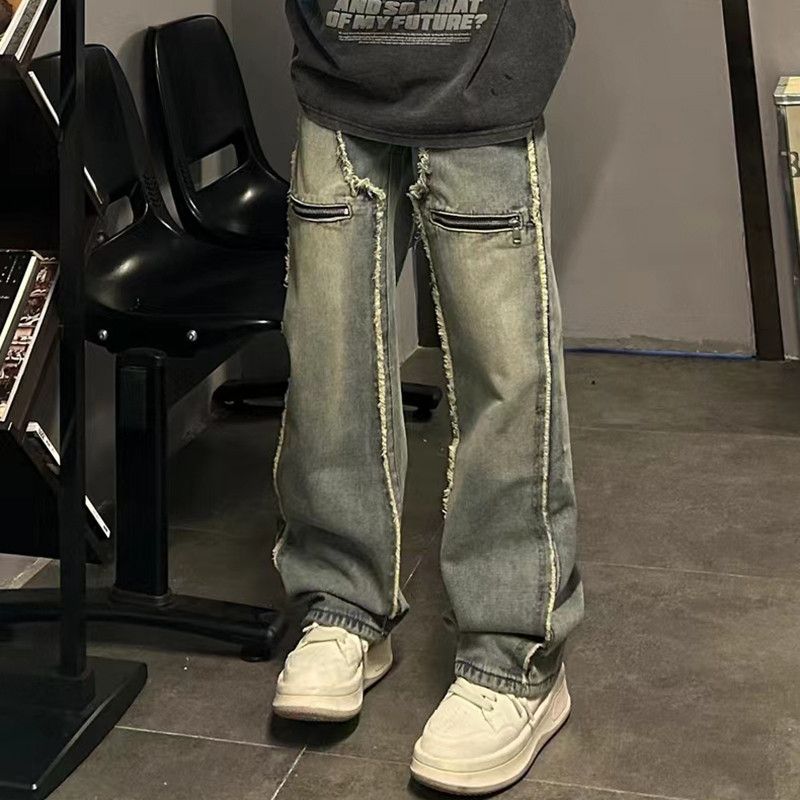Ripped tassel frayed zipper pocket cleanfit baggy jeans