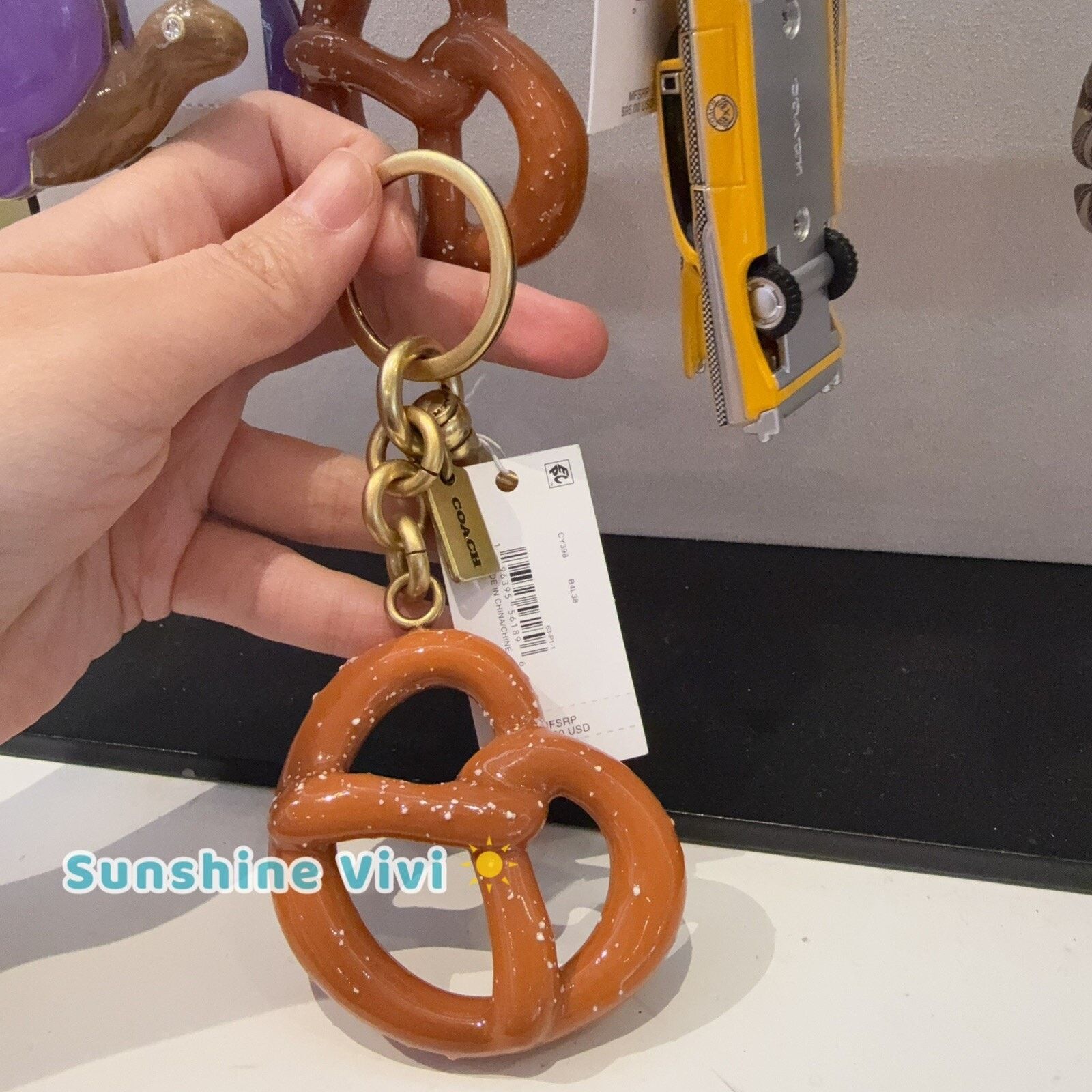 Coach NWT Coach Small Pretzel Bag Charm Keychain Brass Brown CY398