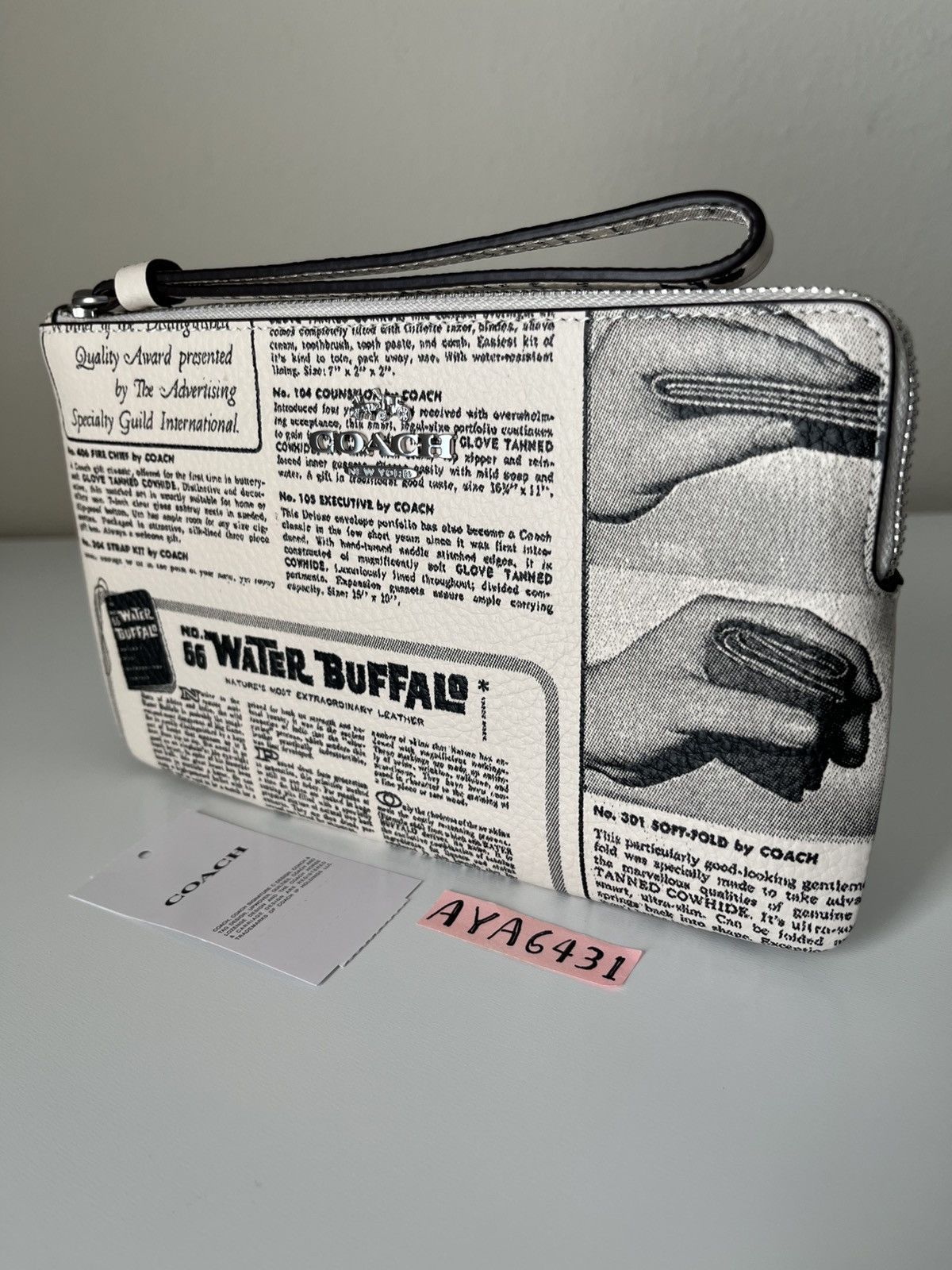 Coach Coach Large Corner Zip Wristlet With Newspaper Print Size ONE SIZE - 1 Thumbnail
