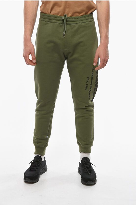 image of Alexander Mcqueen Drawstringed Joggers With Contrasting Logo Lettering in Green, Men's (Size 33)