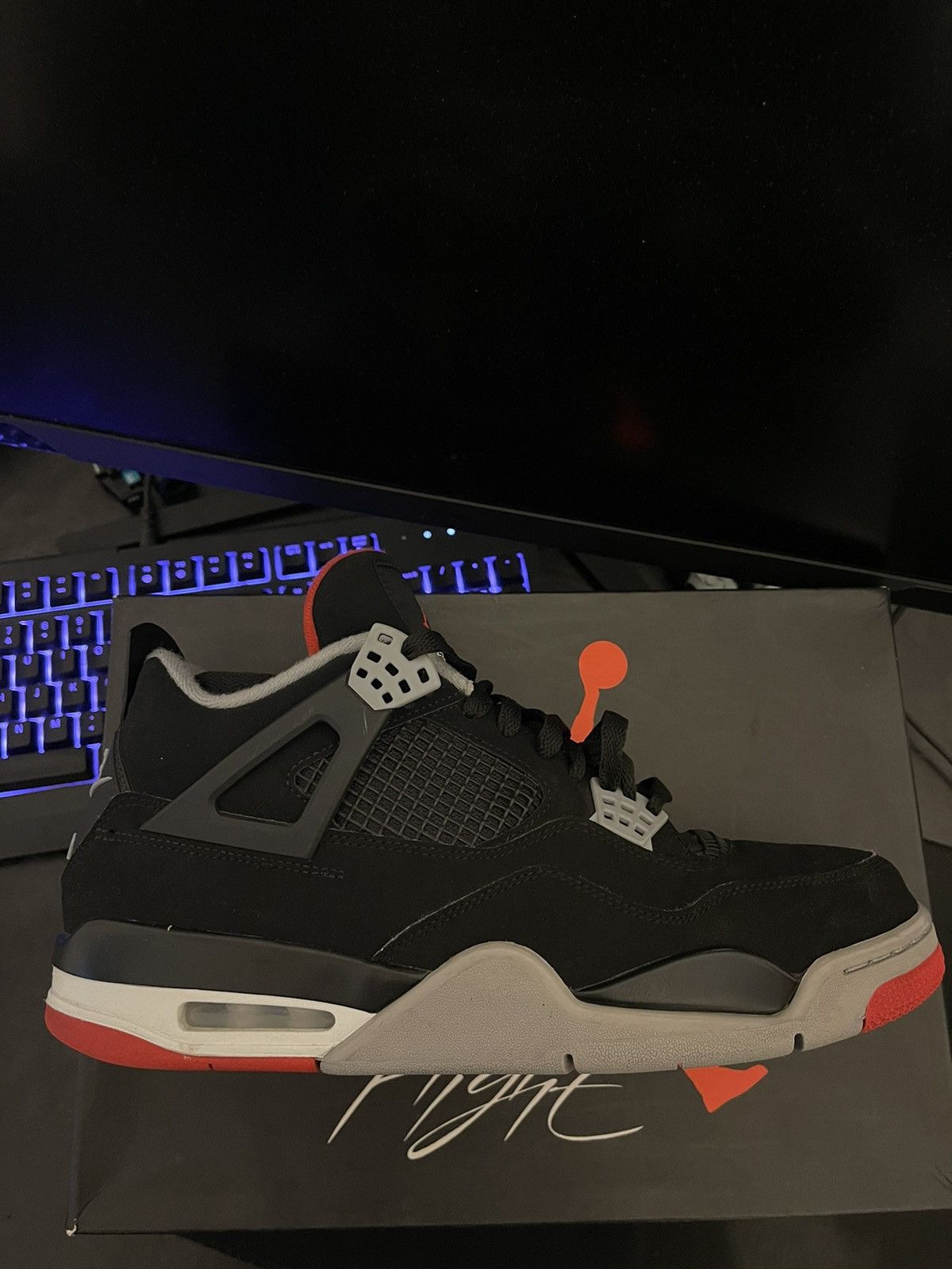 image of Jordan Nike Jordan 4 Bred 2019 Shoes in Black, Men's (Size 11)