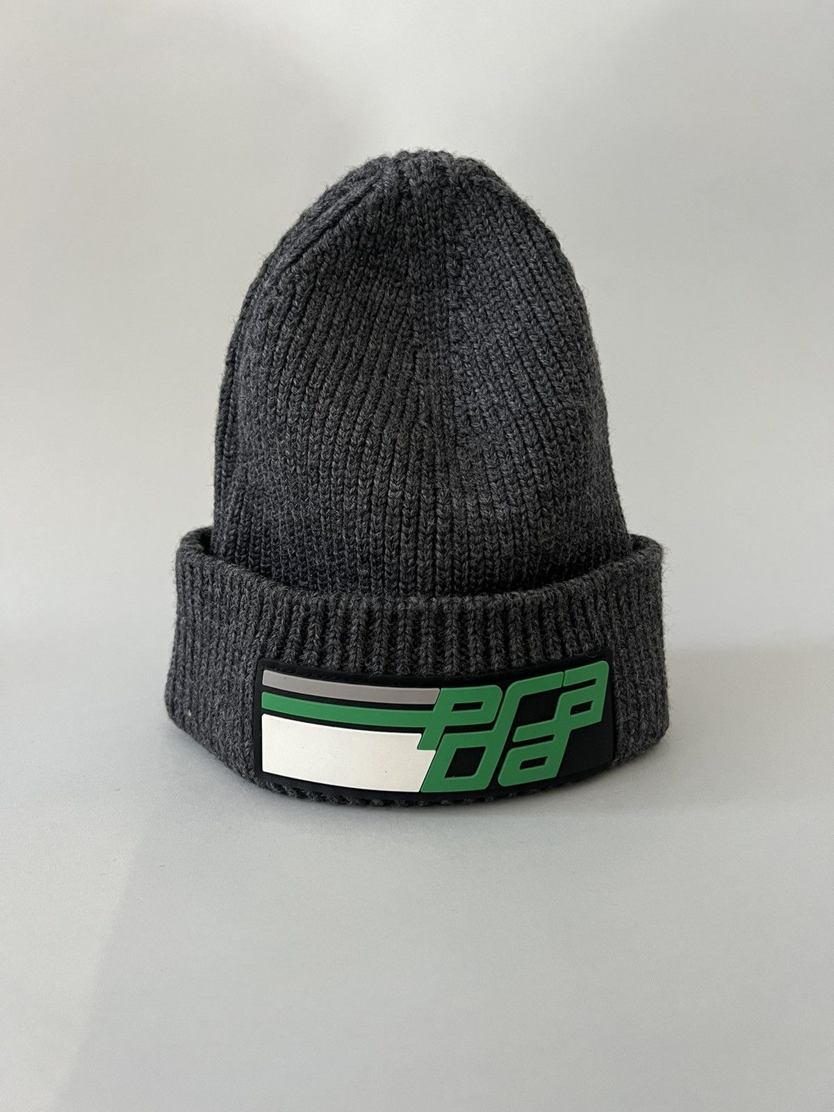 image of Prada Wool Beanie With Rubber Patch in Grey, Men's