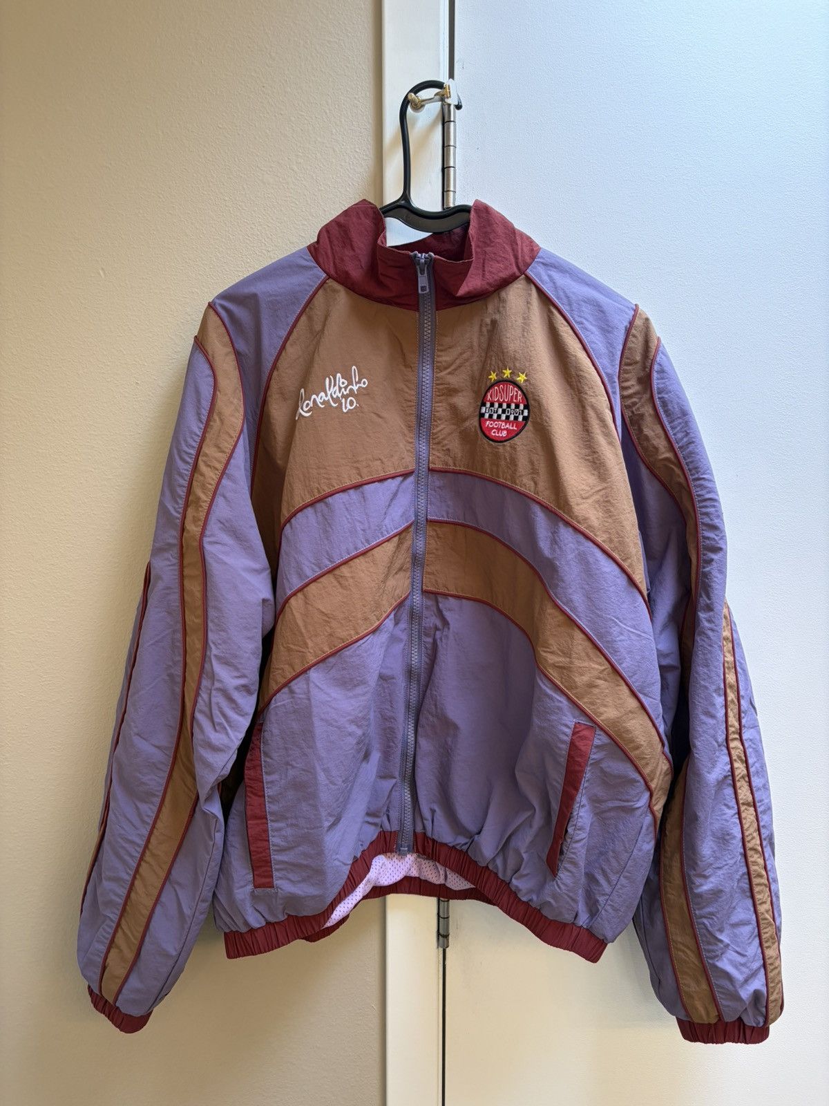 KidSuper RONALDINHO X KIDSUPER WINDBREAKER [BLUE/ RED / BROWN] Size US S / EU 44-46 / 1 - 1 Thumbnail