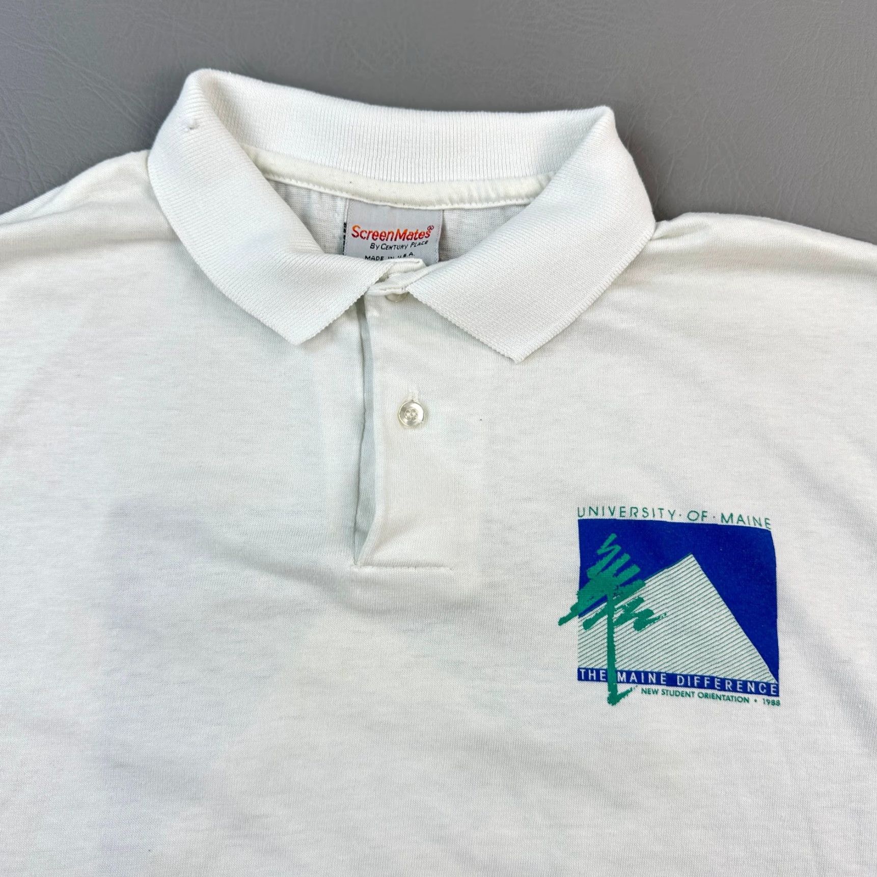 Vintage VINTAGE University of Maine Polo Shirt Mens XL 1988 Student Orientation USA Polo Shirt Mens XL White 80s Retro USA Mens Polo Shirt Size US L / EU 52-54 / 3 - 5 Thumbnail