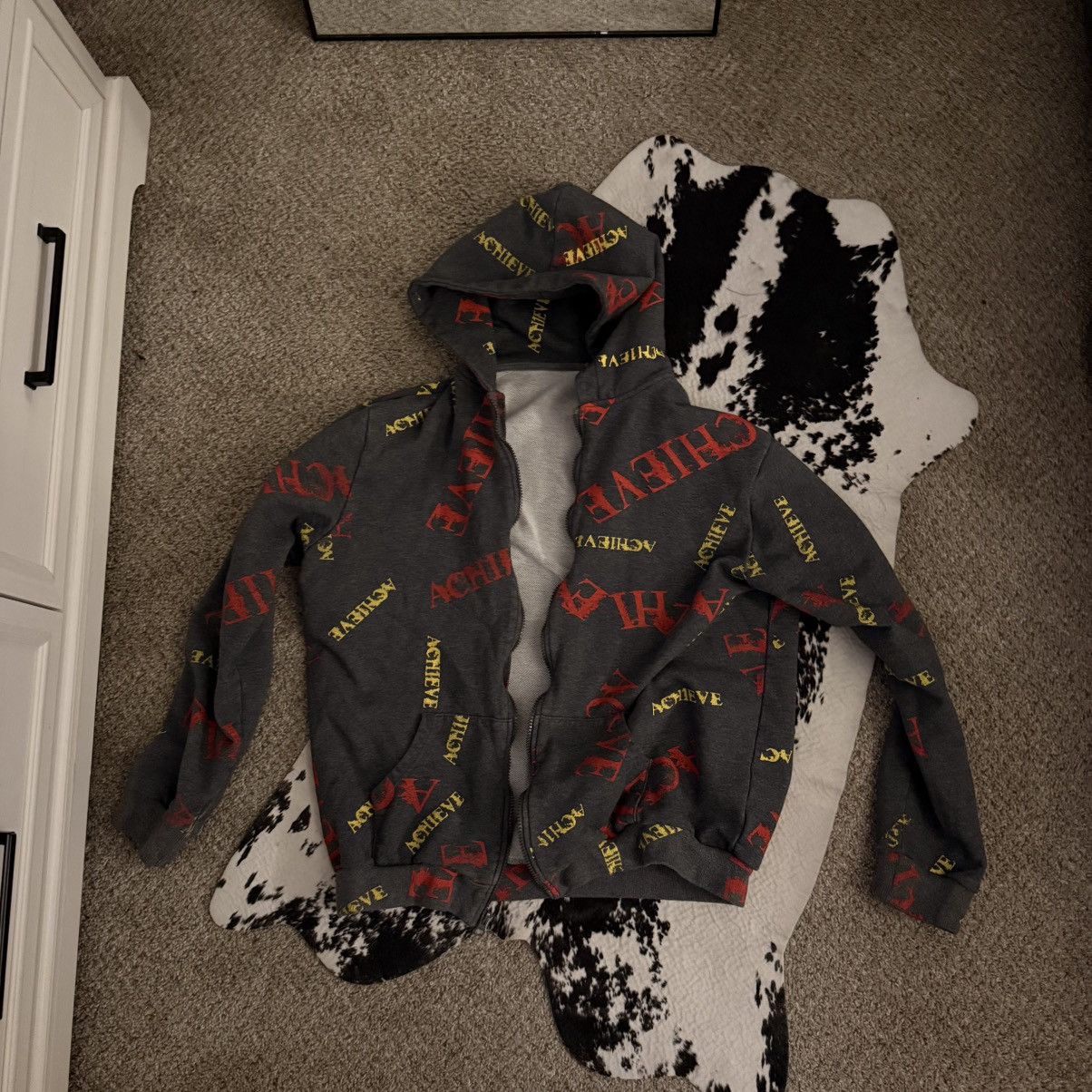 Other Grey hoodie with achieve on it in red and yellow colors Size US M / EU 48-50 / 2 - 1 Thumbnail