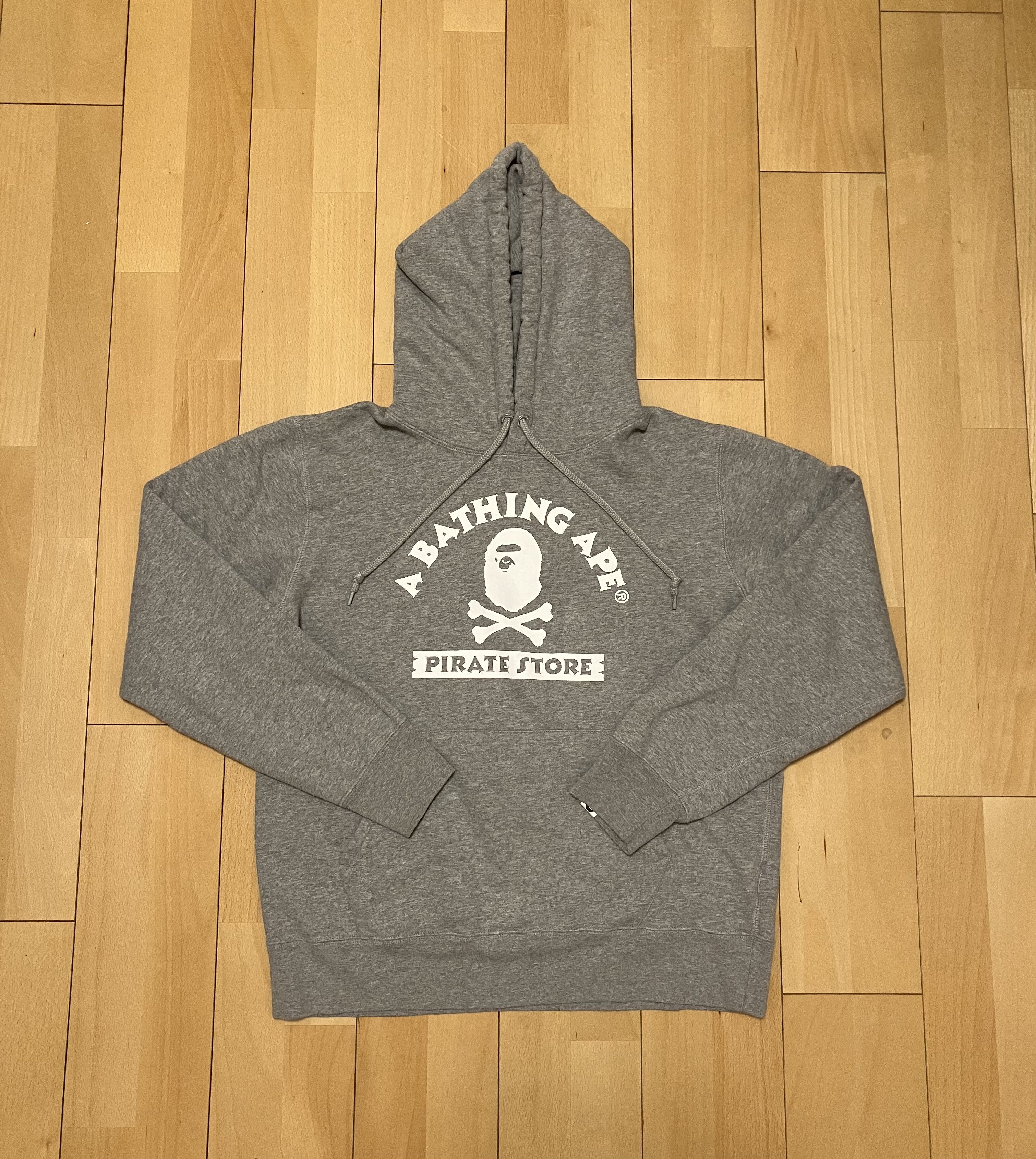 image of Bape Pirate Store Pullover Hoodie in Grey, Men's (Size XL)