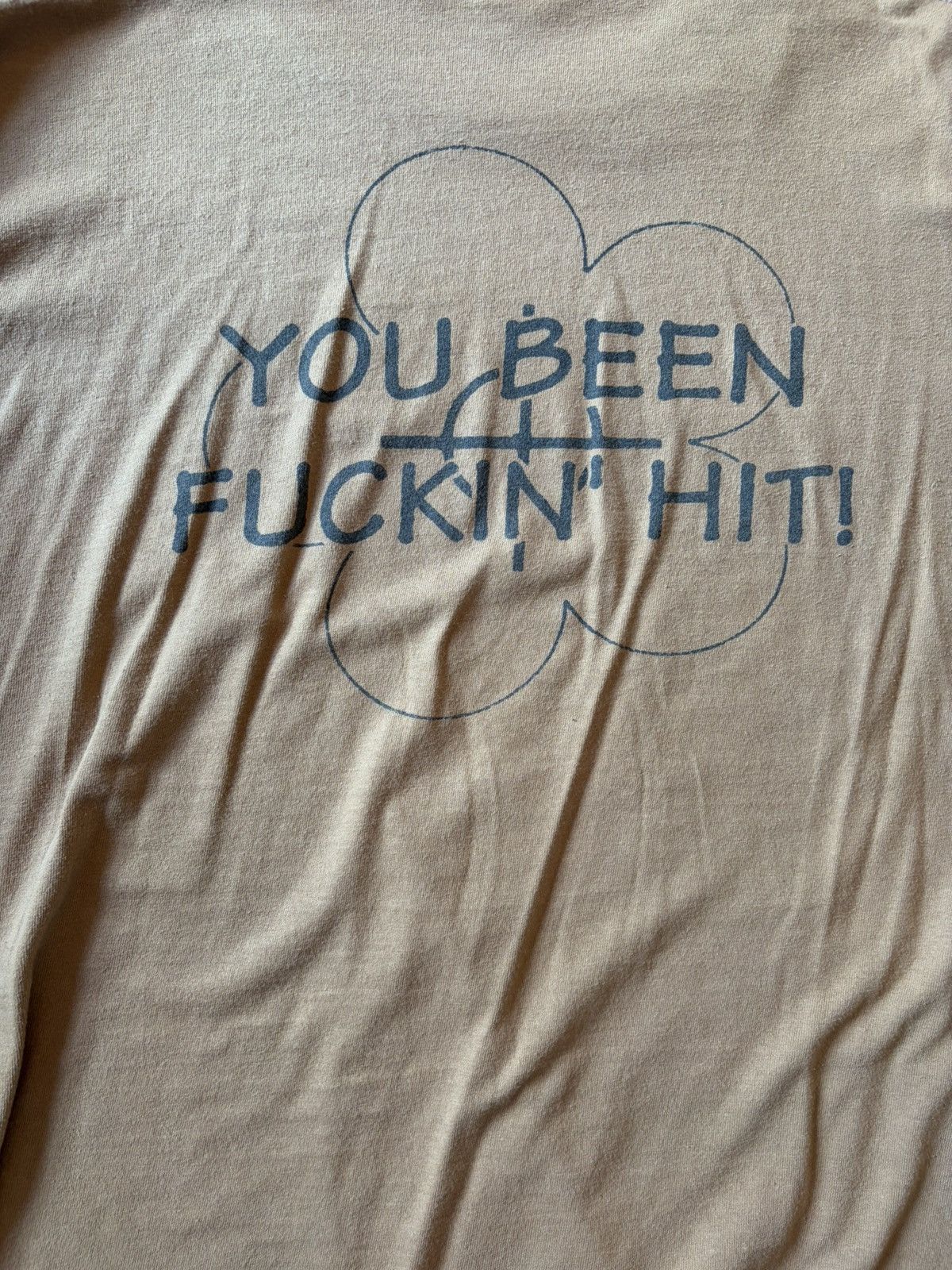 Supreme “You’ve been hit” tee