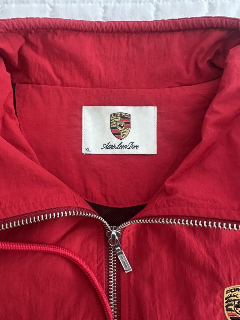 Aime Leon Dore × Porsche Design Aime Leon Dore Porsche Nylon Track Jacket Men’s Tango Red Size US XL / EU 56 / 4 - 7 Thumbnail