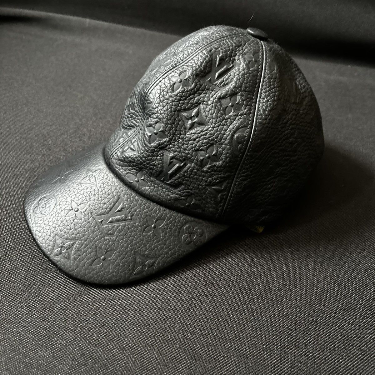 image of Louis Vuitton Leather Cap - Embossed Monogram in Black, Men's