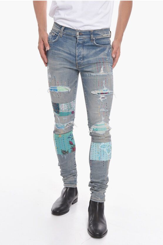 Image of Amiri Vintage-Effect Artpatch Skinny Denims With Embroidered Detai in Light Blue, Men's (Size 33)