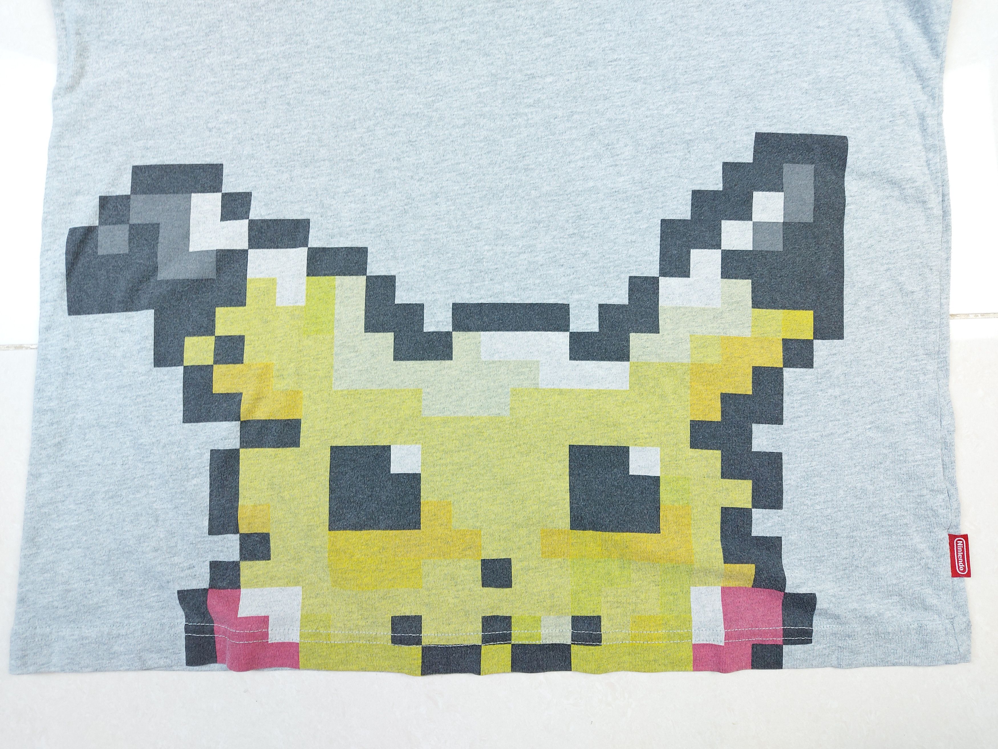 Nintendo × Pokemon × Uniqlo Uniqlo Nintendo Pokemon Pikachu UTGP 2017 Double-Sided TEE Size US M / EU 48-50 / 2 - 4 Thumbnail