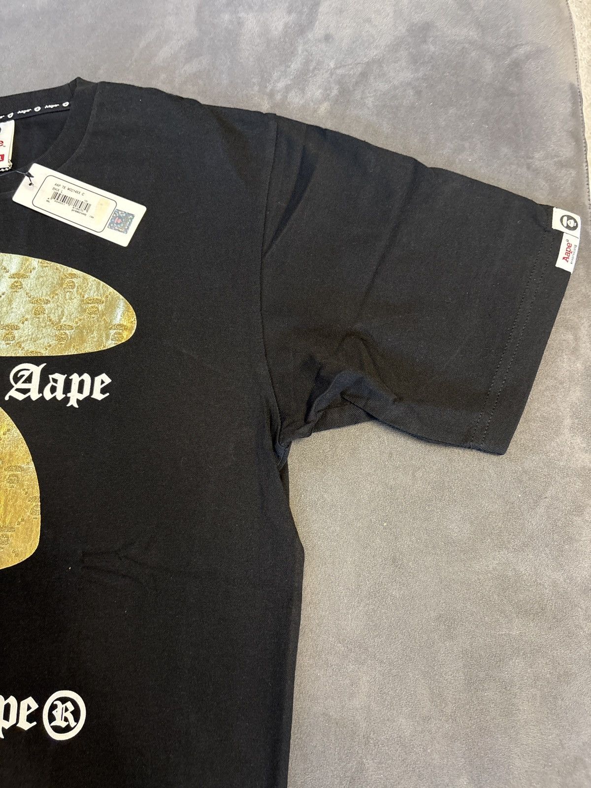 Aape × Bape Aape by a bathing ape black and gold tee Size US L / EU 52-54 / 3 - 4 Thumbnail