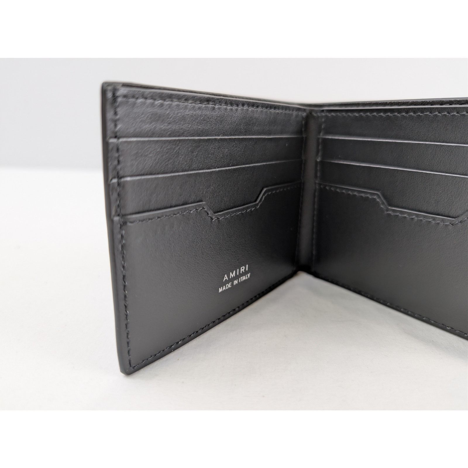 Amiri o1rshd1 Size: OS / Nappa Amiri Bifold Wallet in Black Size ONE SIZE - 6 Thumbnail