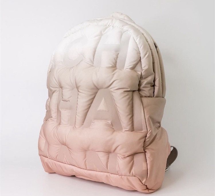 image of Chanel Nylon Doudoune Logo Embossed Puffer Backpack in Pink, Men's