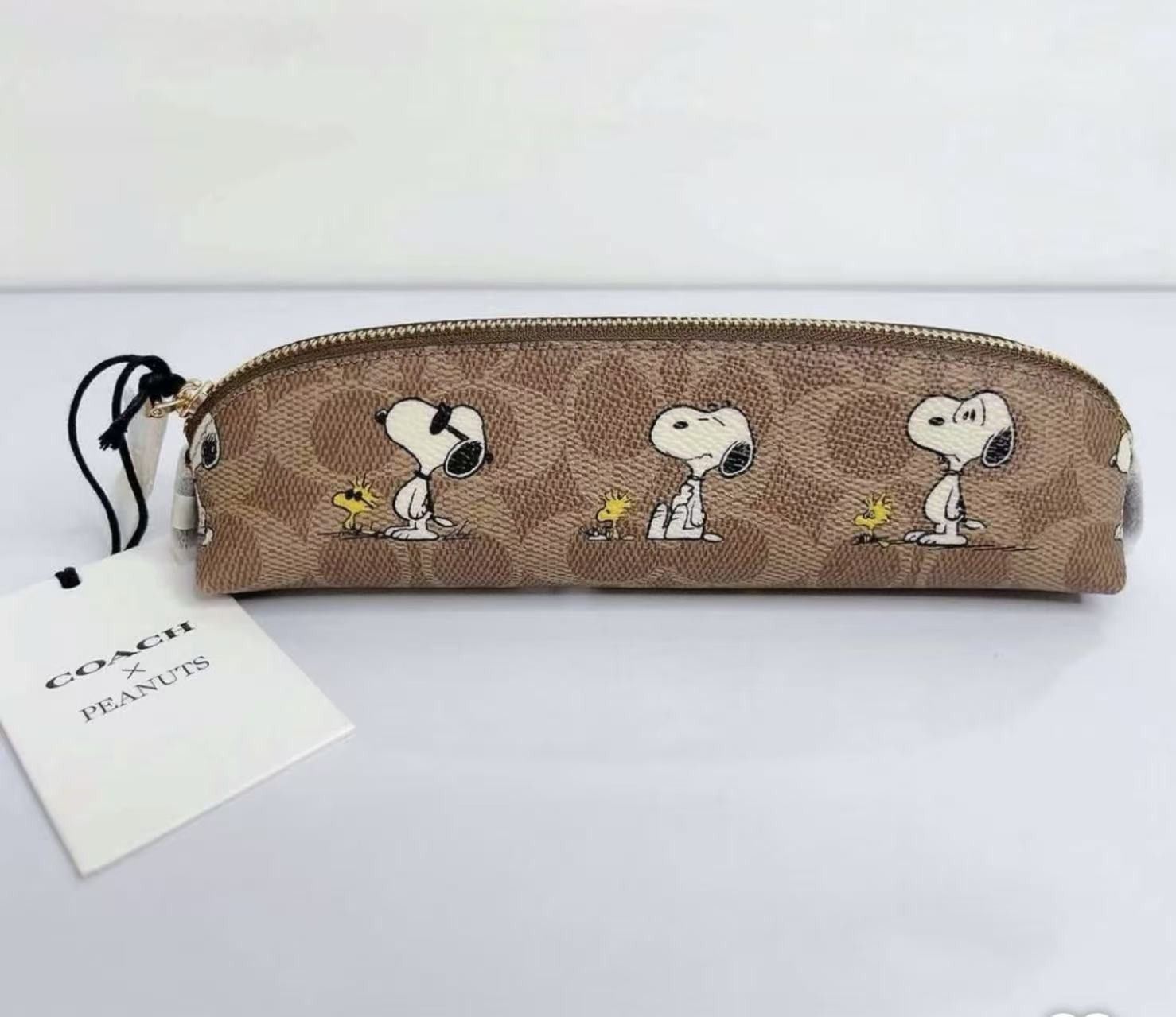 Coach Coach X Peanuts Pencil Case In Signature Canvas Snoopy CBT17 Size ONE SIZE - 1 Thumbnail