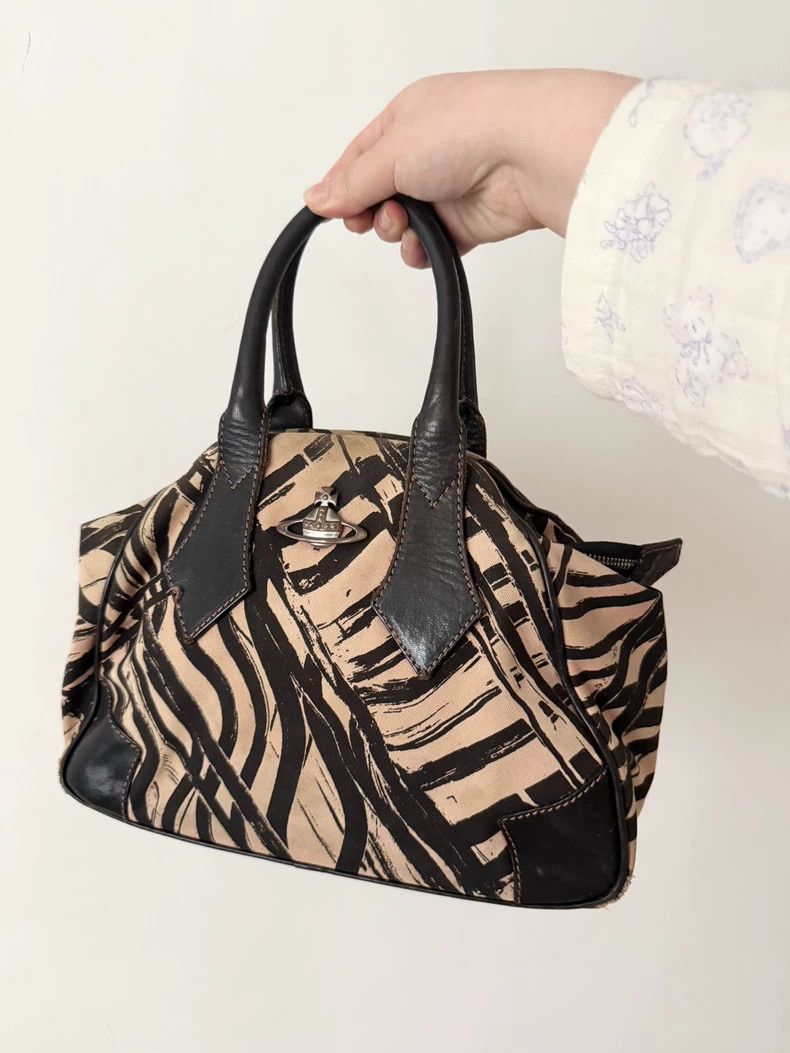 Vivienne Westwood Black and white imprints Silver Saturn O