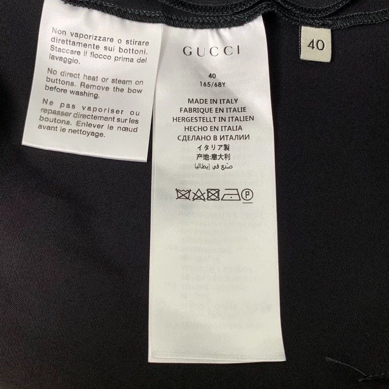 Gucci Black bow rhinestone striped cotton casual trousers 2