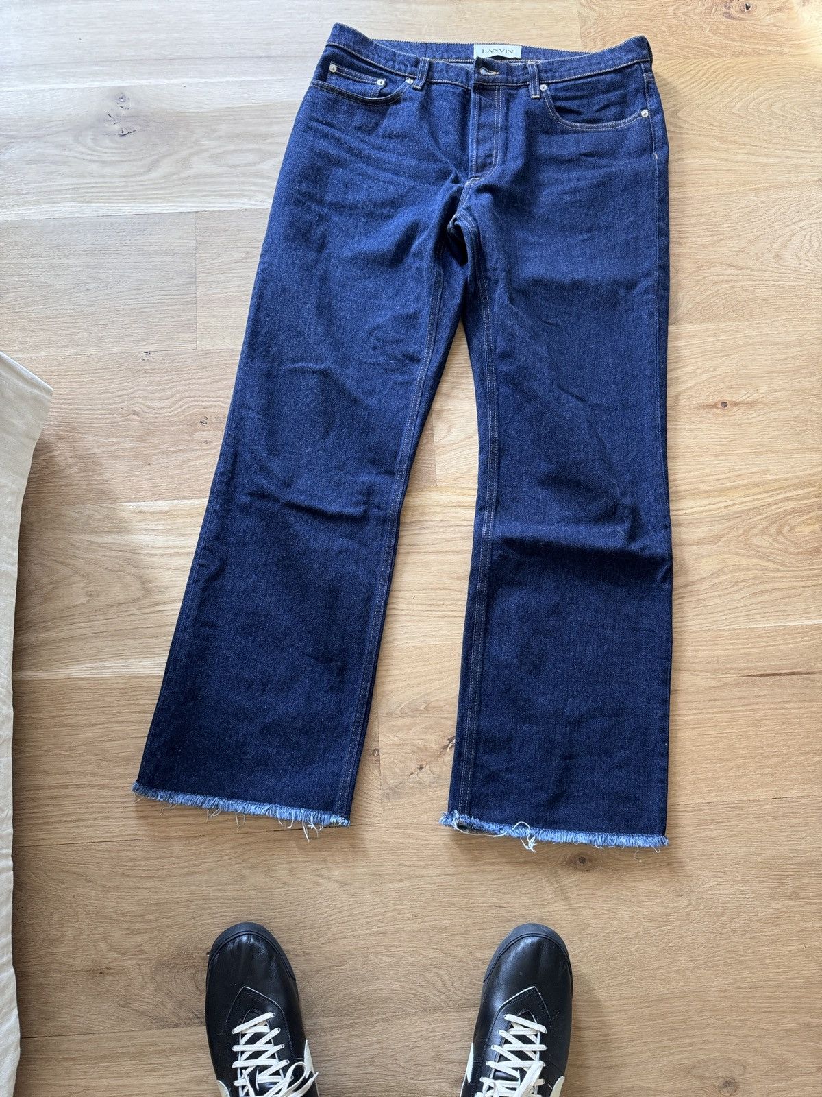 image of Lanvin Wide Leg Frayed Hem Jeans in Blue, Men's (Size 33)