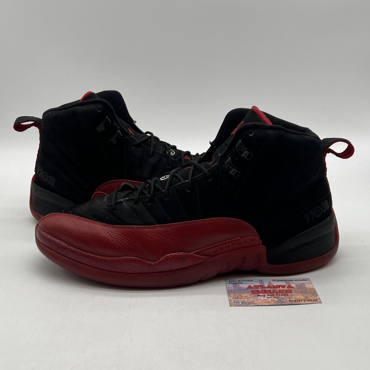 image of Air Jordan 12 Flu Game Shoes in Black, Men's (Size 14)