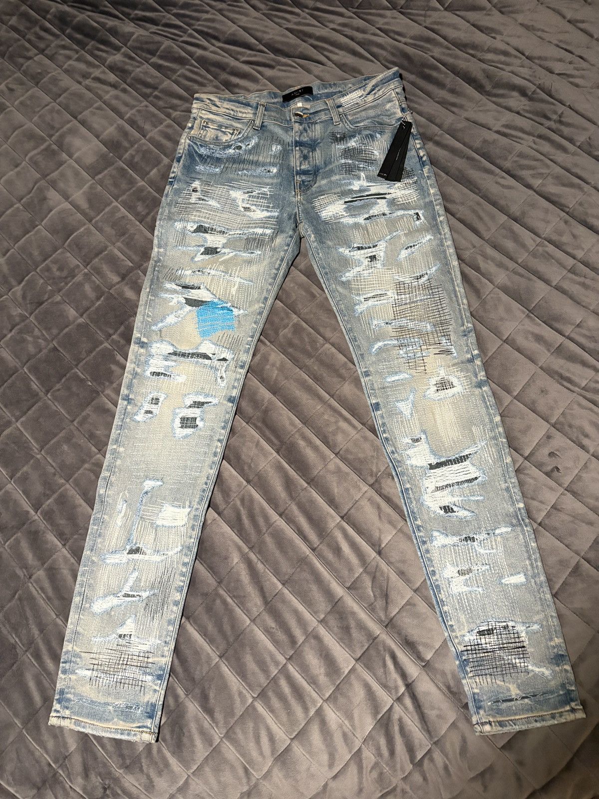 Amiri AMIRI All Over Repair Jeans (Clay Indigo) | Grailed