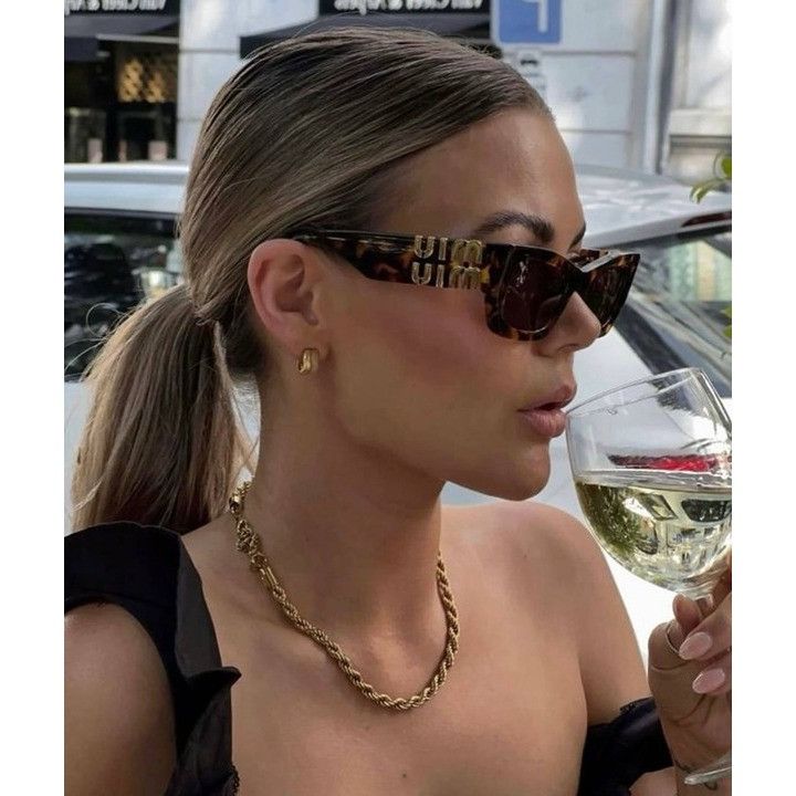 Miu Miu MU09WS VAU06B Sunglasses Honey Havana Cat Eye Frame display picture 2