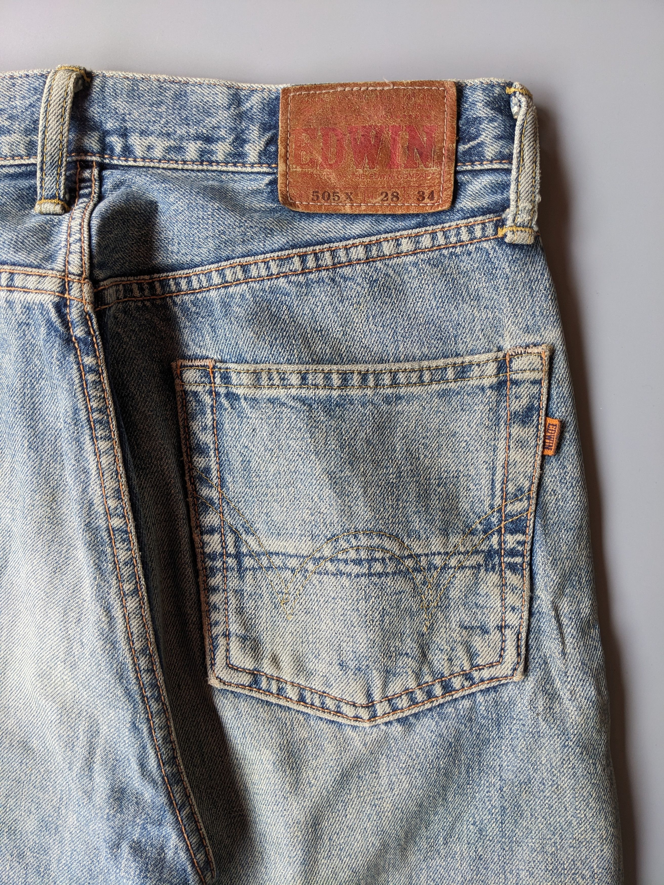 Edwin 505x faded blue distressed selvedge jeans