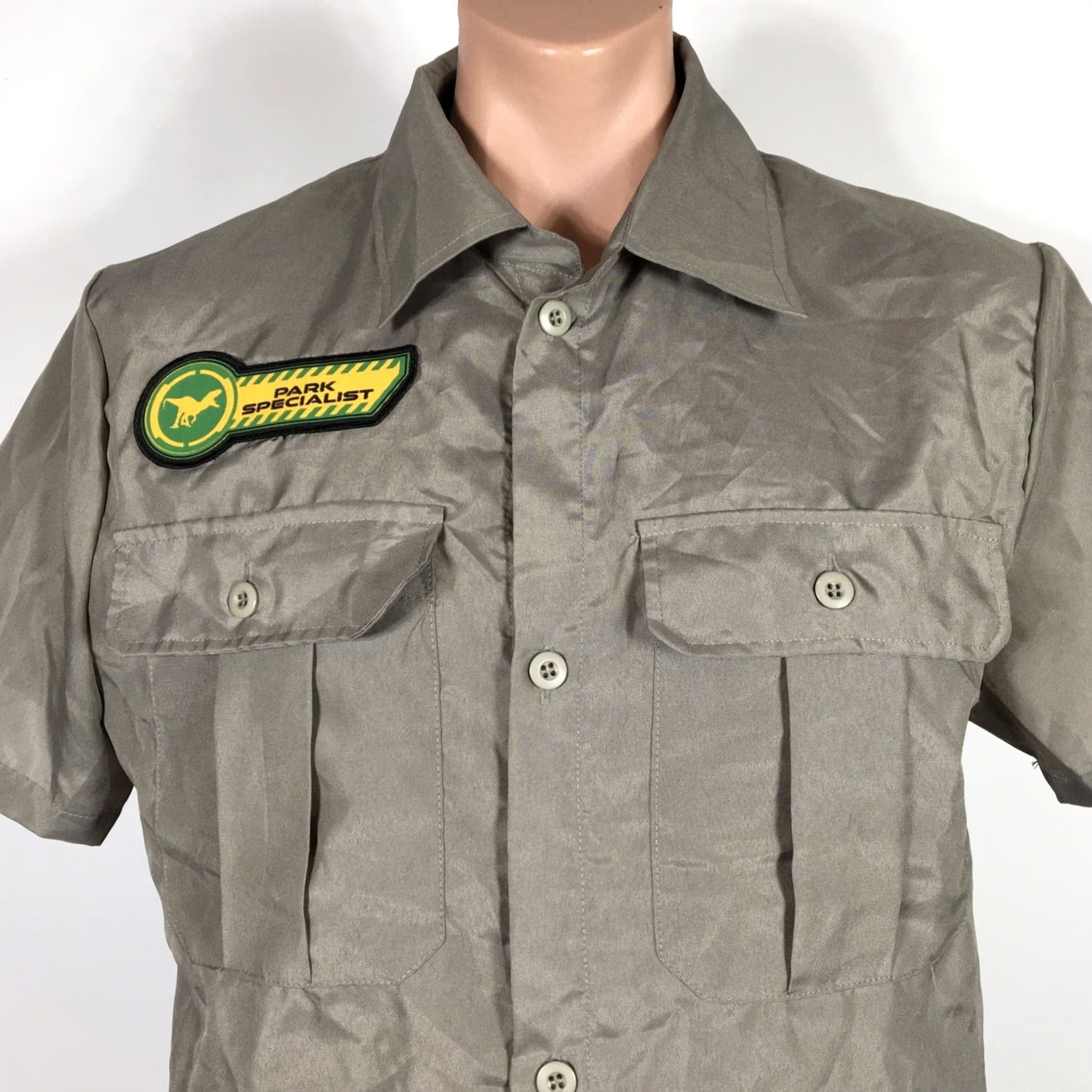 Vintage Jurassic World Mens M Gray Greige Park Specialist Employee Costume Universal Short Sleeve Button-Up Shirt Casual Travel Regular Fit Mens Size US M / EU 48-50 / 2 - 7 Thumbnail