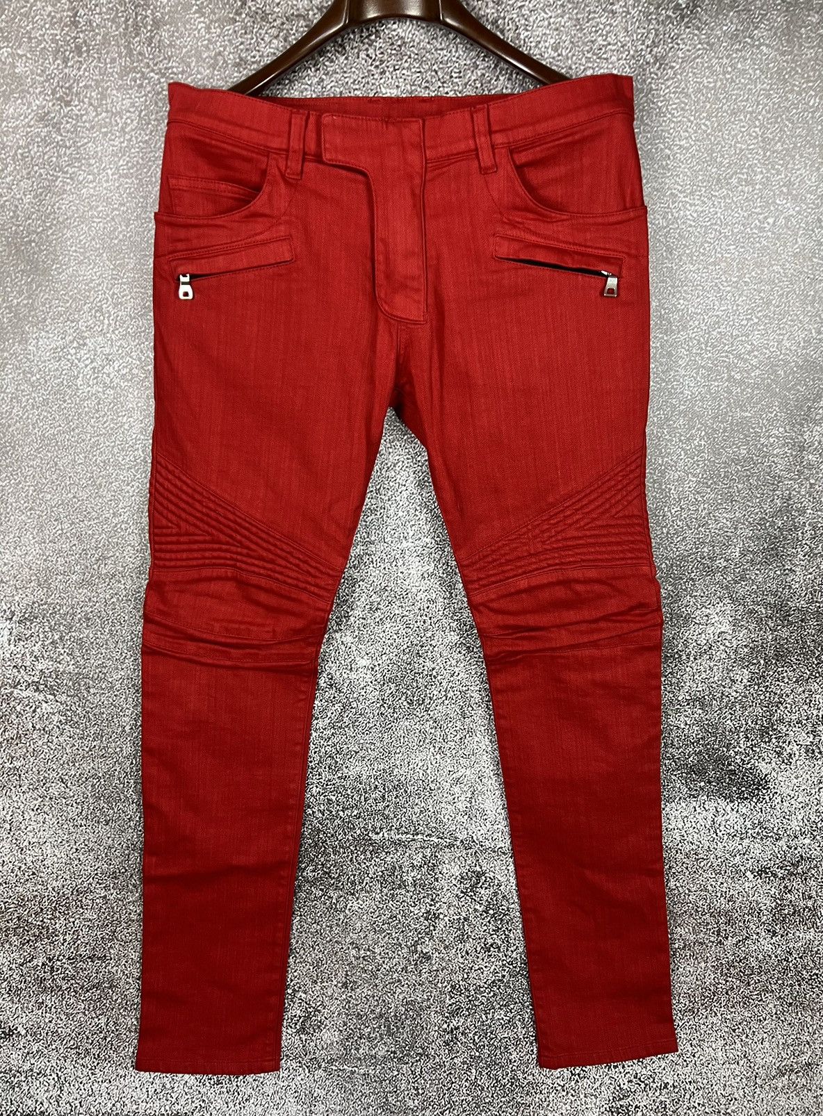 Shops red biker jeans