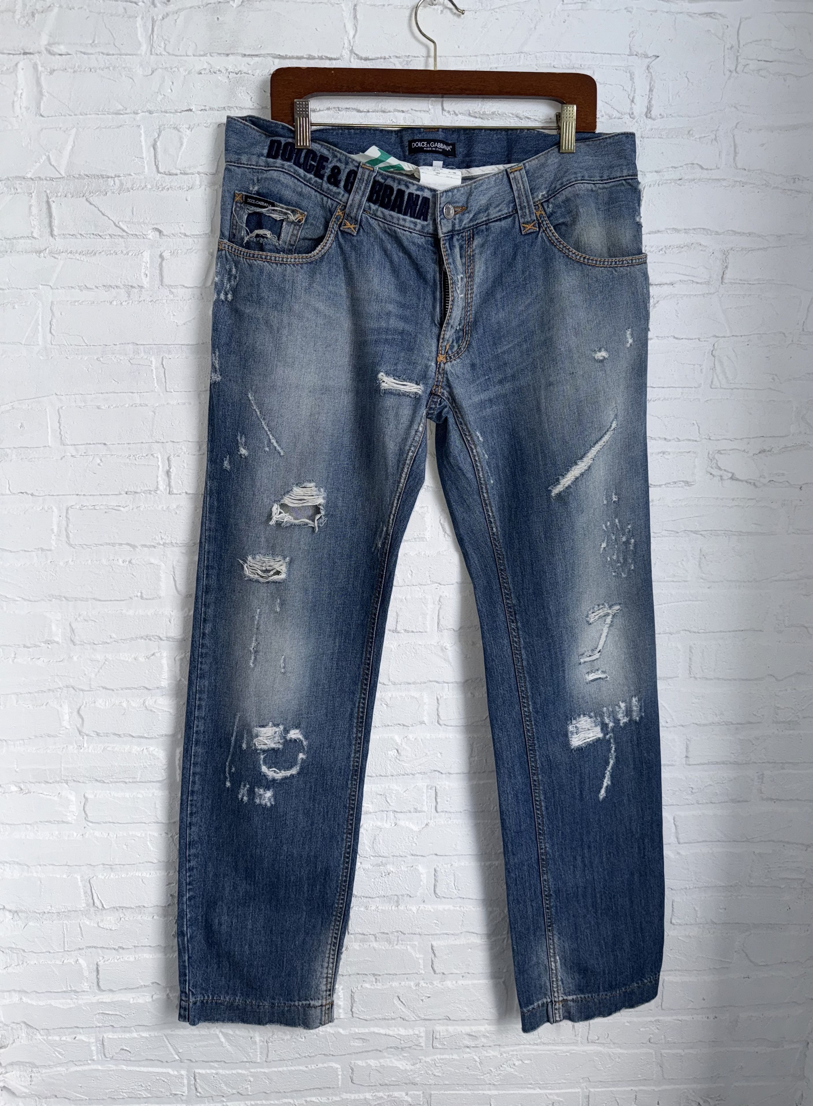 Vintage 2000s Dolce & Gabbana distressed jeans peace logo