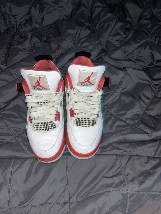 fire red jordan 4 stockx