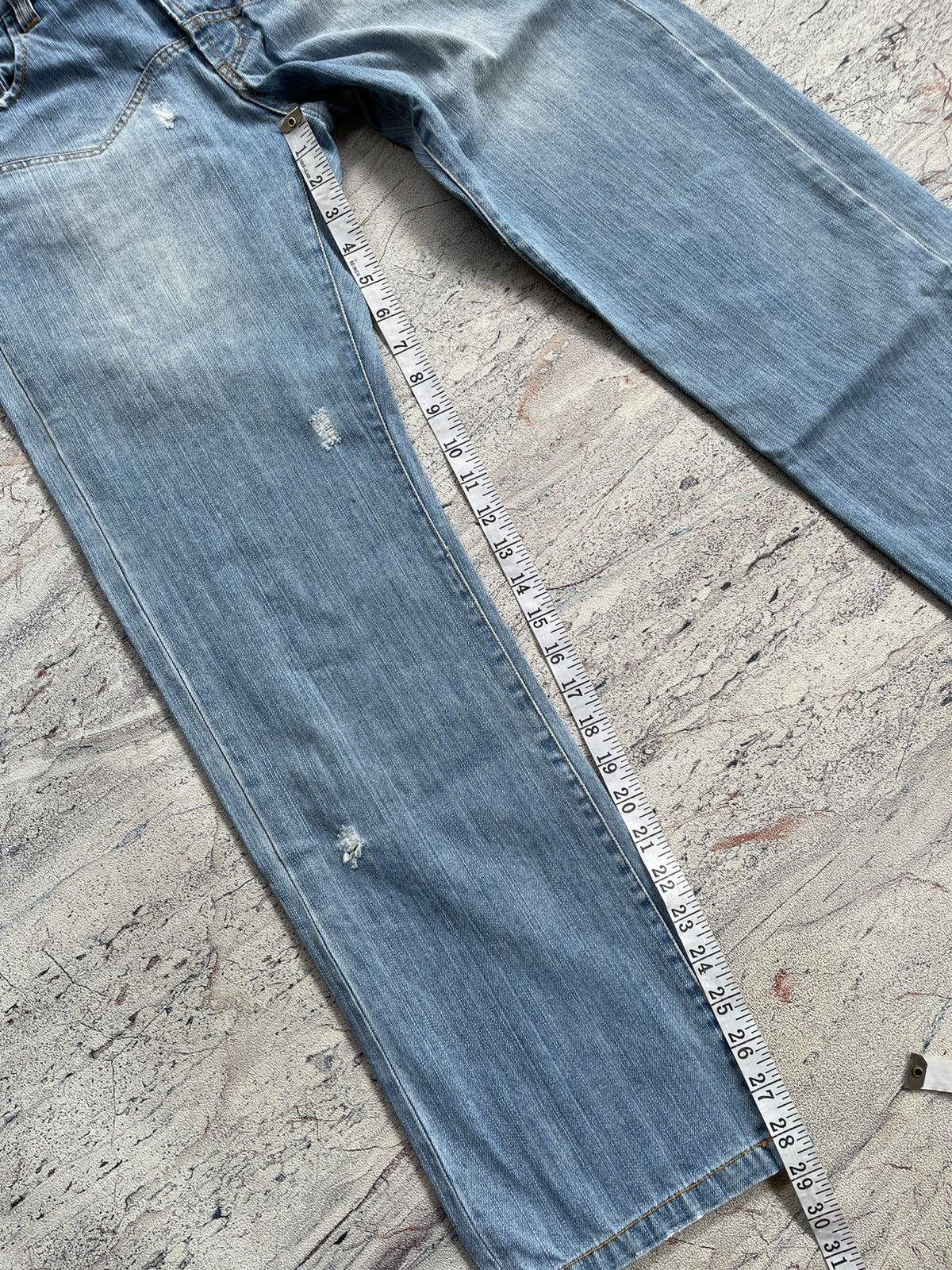 Sunao kuwahara distressed jeans by issey miyake