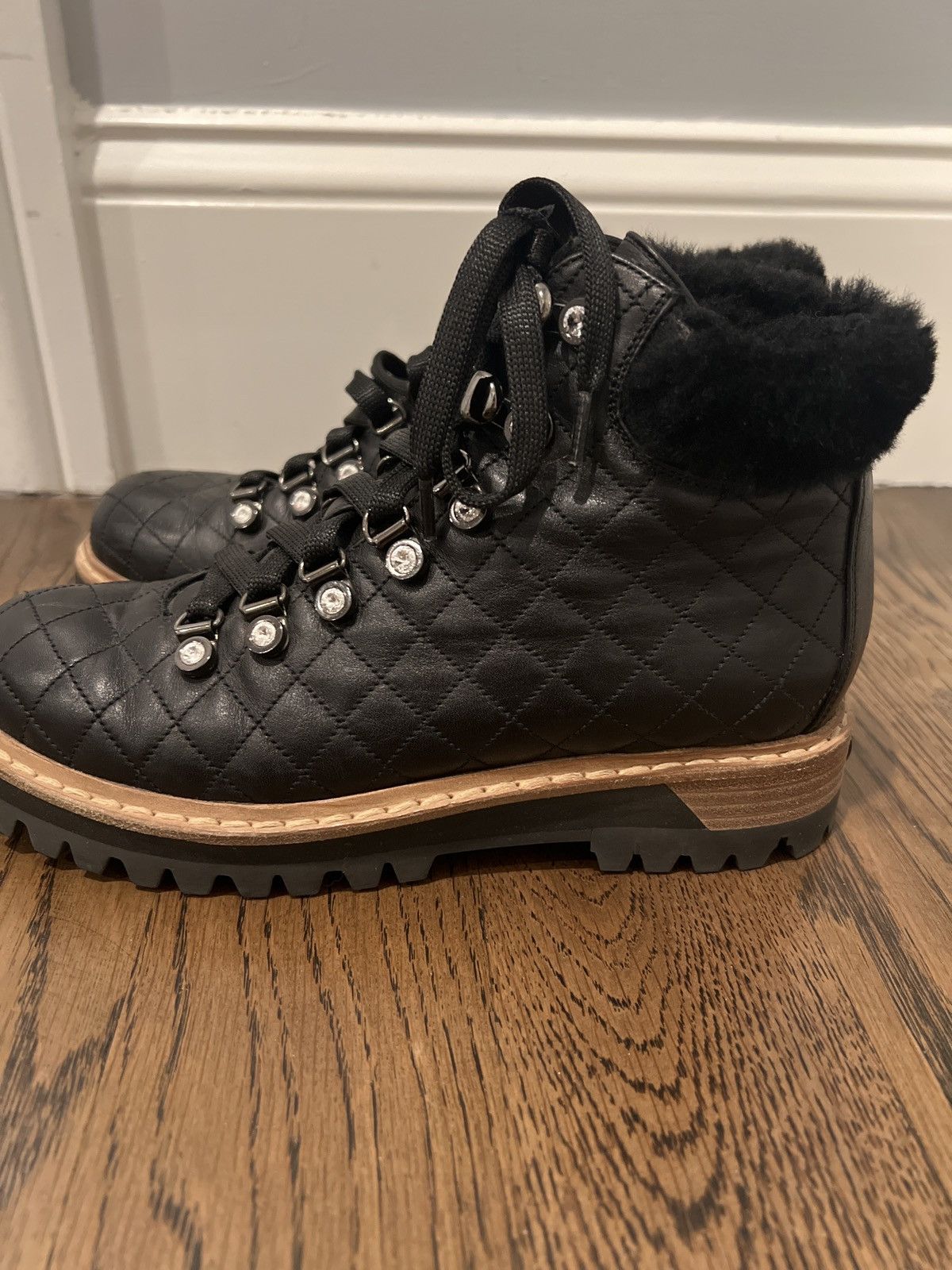 Black boots with fur and Rhinestones .