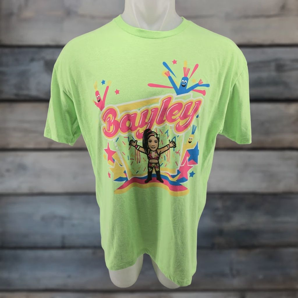SOMET WWE X Nerds Bayley We Want Some Bayley Cartoon T-Shirt XL Mens Green Graphic Print Size US XL / EU 56 / 4 - 1 Thumbnail