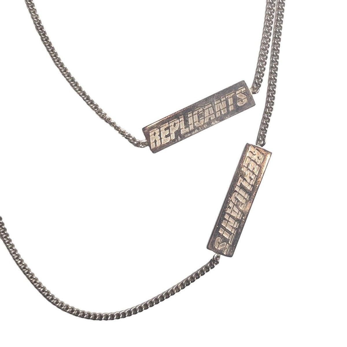 Raf Simons チェーン Raf Simons Black Cherries Twisted Wallet Chain in Silver | FWRD