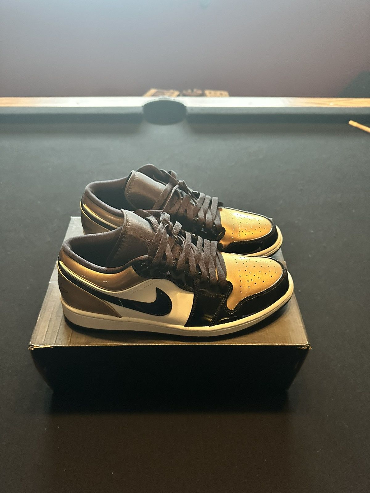 jordan one low gold toe
