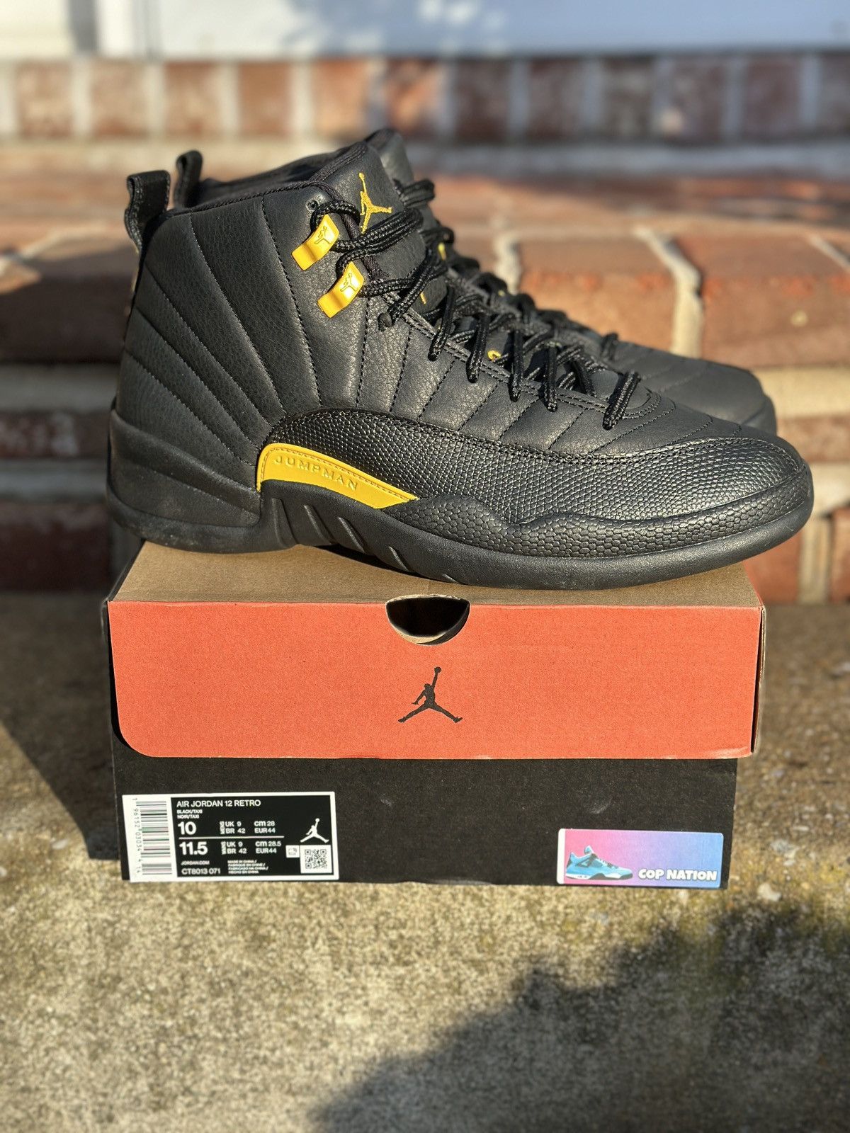 Jordan Brand Nike Air Jordan 12 Retro Black Taxi (10M) Size US 10 / EU 43 - 1 Thumbnail