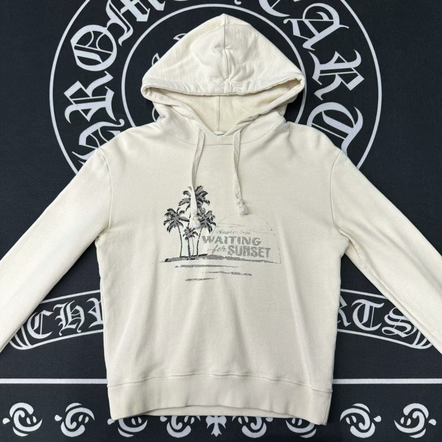white hoodie with palm tree print