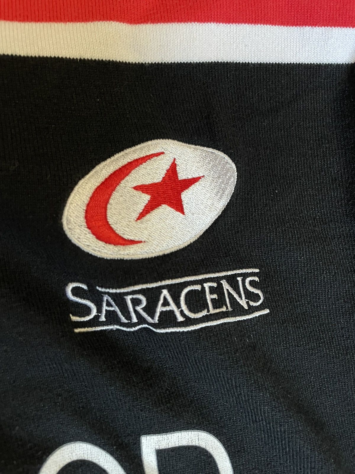 Canterbury of New Zealand × Vintage Saracens 2000 2001 Home Vintage Canterbury rugby shirt size Size US L / EU 52-54 / 3 - 4 Thumbnail