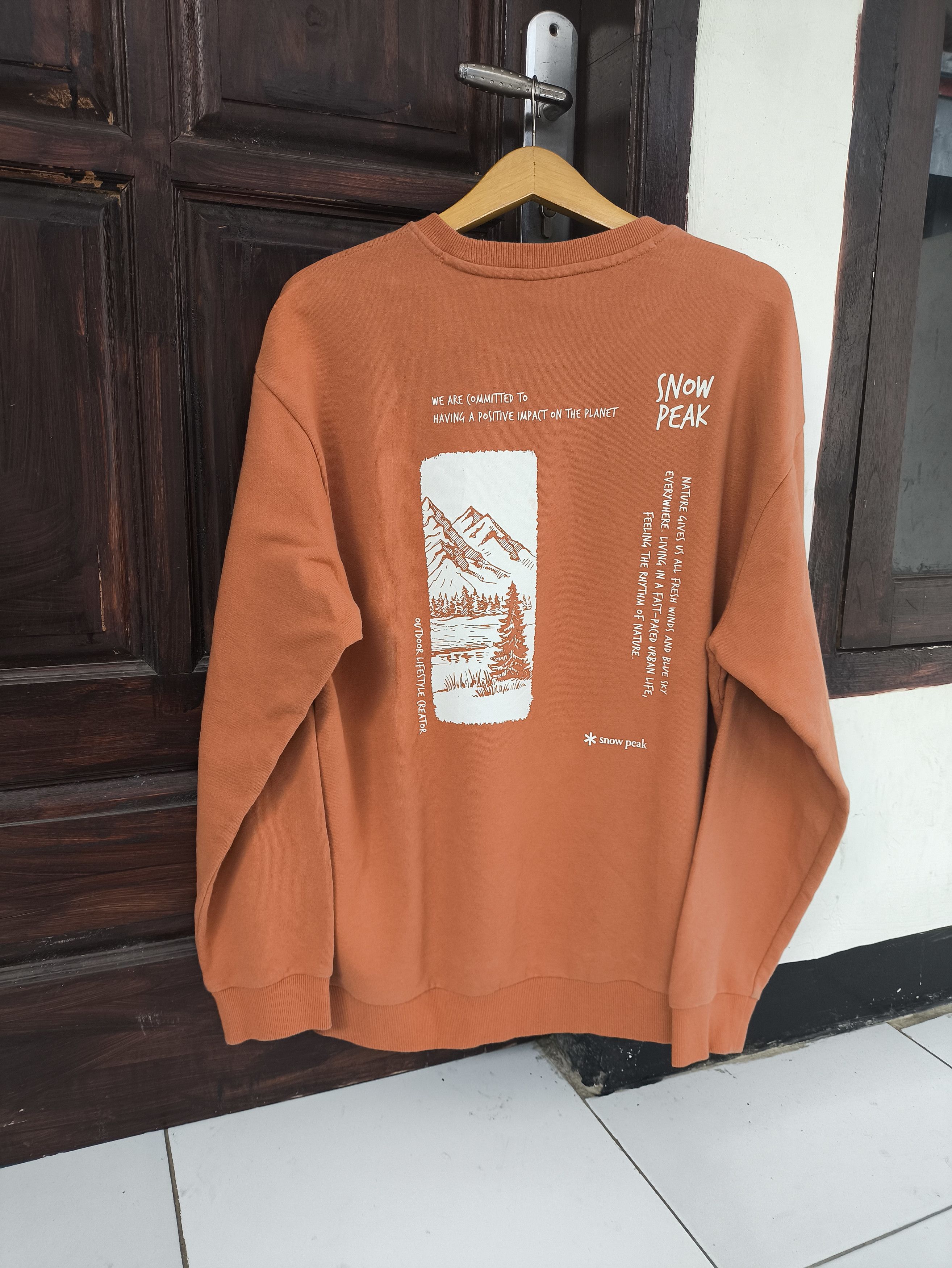 image of Montbell x Outdoor Life Snow Peak Sweatshirt Crewneck Backhit in Carrot, Men's (Size XL)