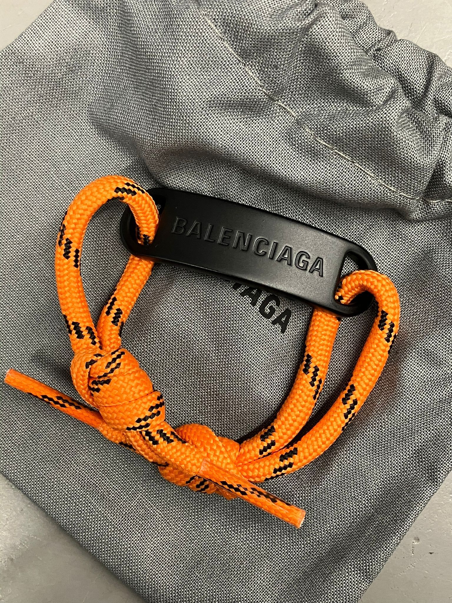 Balenciaga o1mt1gz1024 Size: OS / Plate Bracelet in Orange/Black Size ONE SIZE - 1 Preview