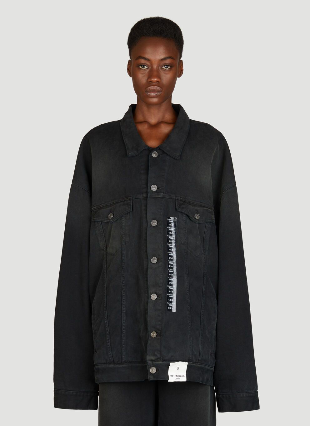 image of Balenciaga Size Sticker Denim Jacket in Black, Women's