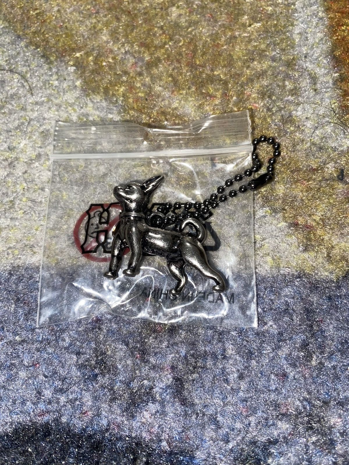 Huf × Nike Nike x HUF Dog Silver Keychain Size ONE SIZE - 1 Thumbnail