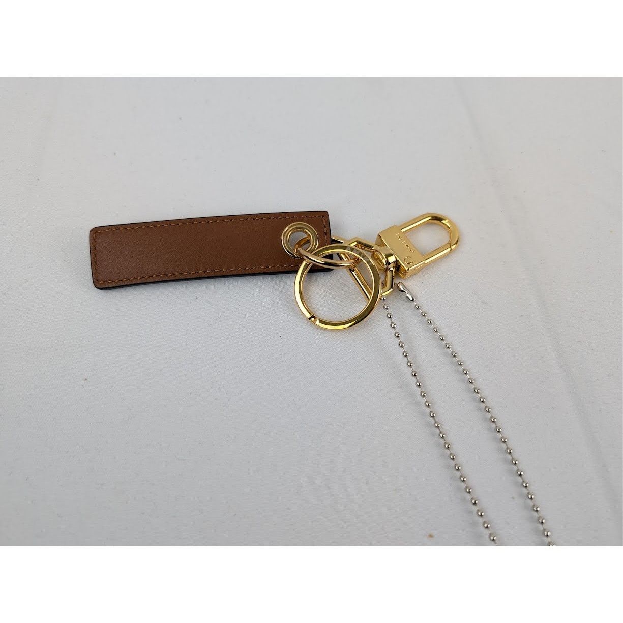 Amiri o1rshd1 Q:3 / Size: OS / Nappa Tao Keychain in Brown Size ONE SIZE - 10 Thumbnail