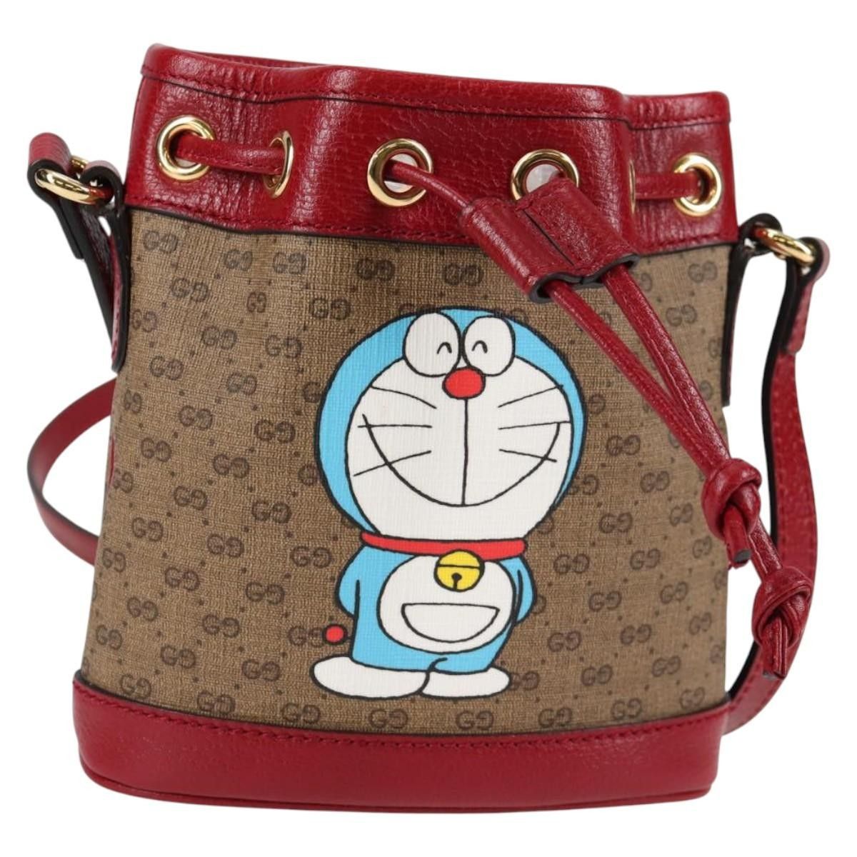 Gucci Gucci Doraemon Bucket Bag Printed Mini GG Coated Canvas Size ONE SIZE - 1 Thumbnail