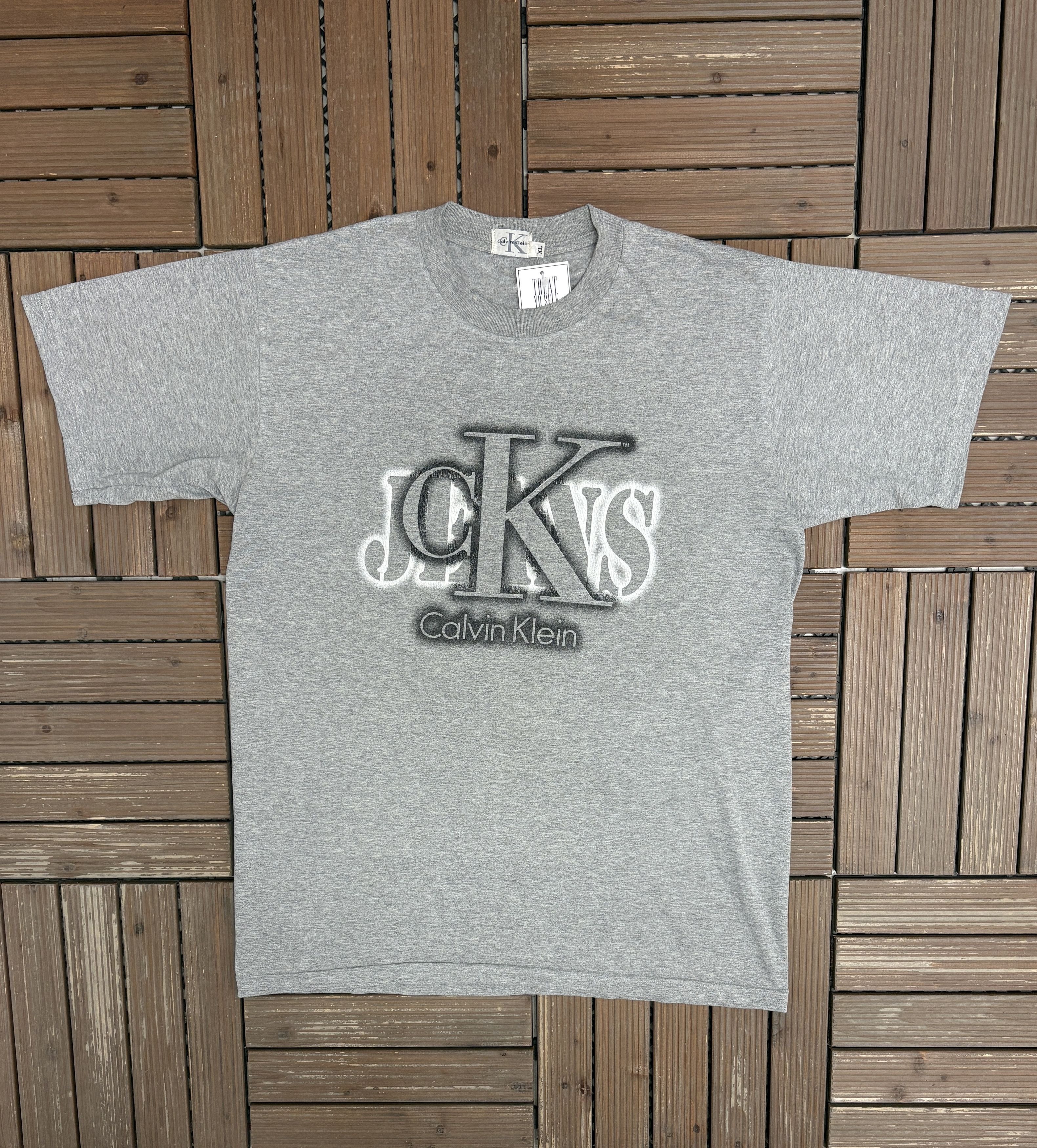 Calvin Klein × Vintage Calvin Klein "Spray Paint" Vintage Grey T-Shirt Tee Size US XL / EU 56 / 4 - 1 Thumbnail