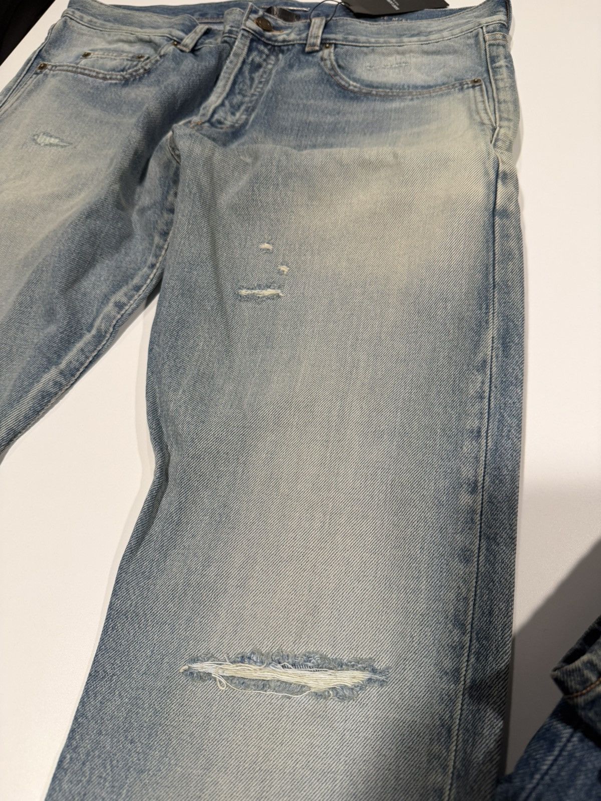 Saint Laurent Paris Saint Laurent men’s ripped blue jeans. 34. $890 Size US 34 / EU 50 - 15 Thumbnail