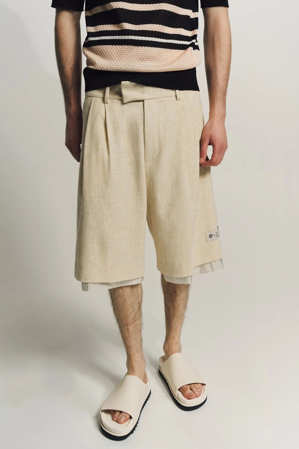 Amiri o1y0525 Logo Short in Light Yellow Size US 38 / EU 54 - 1 Thumbnail